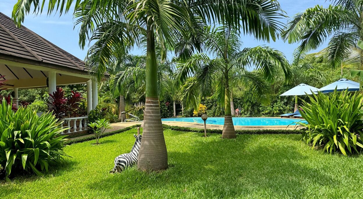 Woning met 3 slaapkamers, tuin en zwembad te Diani Beach