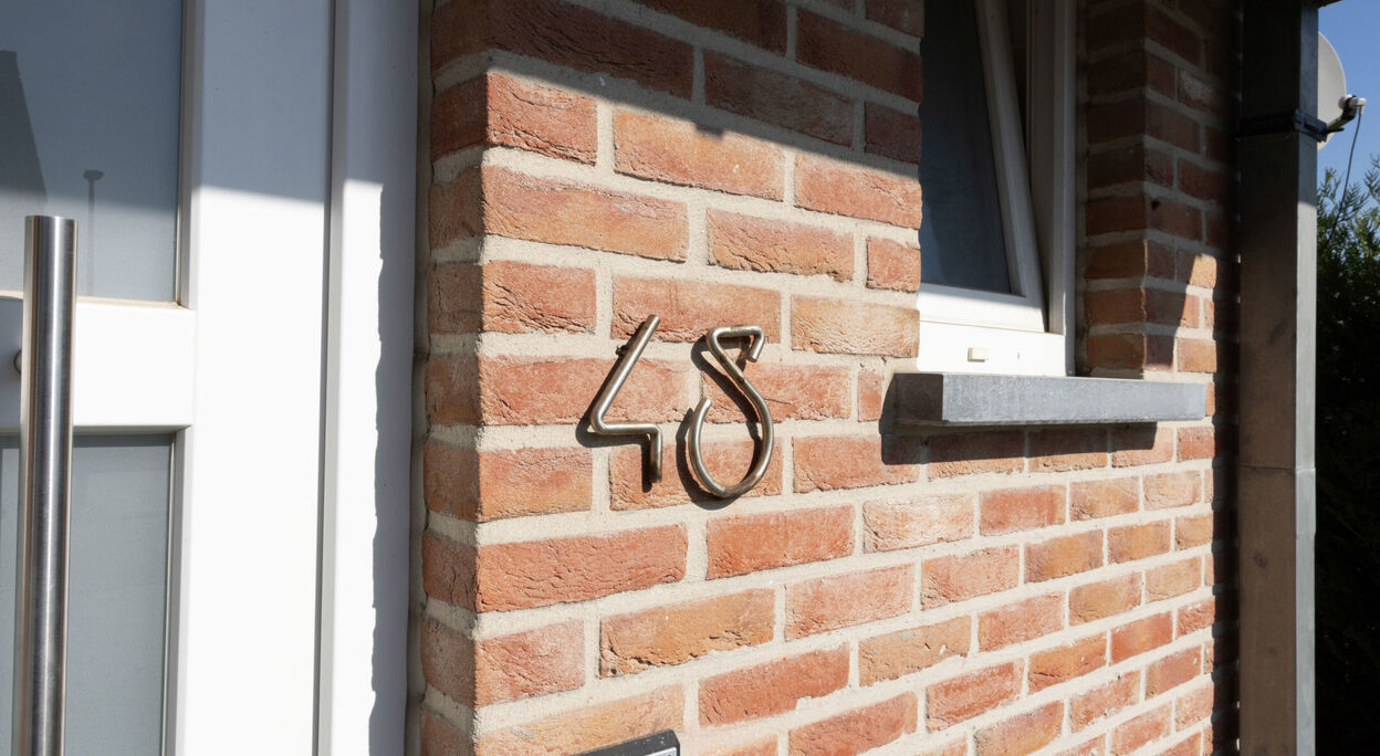 Woning met 3 slaapkamers, terras, garage en tuin te koop in Evergem
