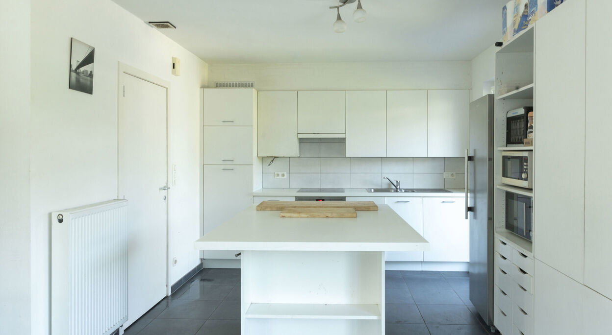 Woning met 3 slaapkamers, terras, garage en tuin te koop in Evergem