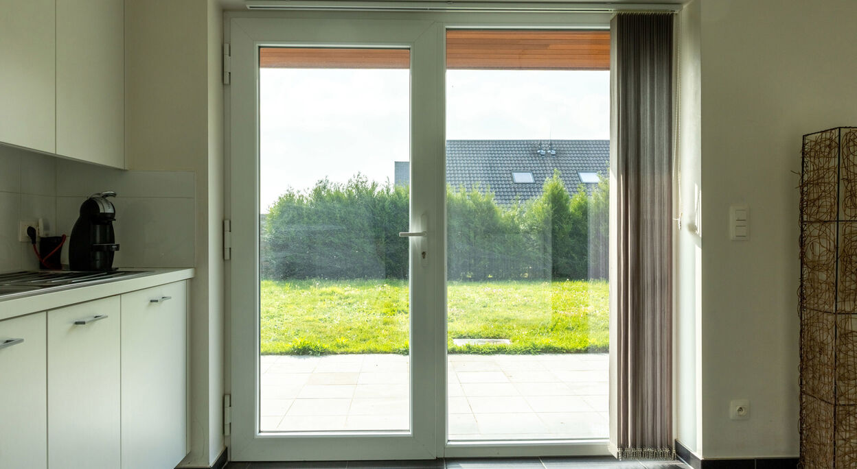 Woning met 3 slaapkamers, terras, tuin en garage te Evergem