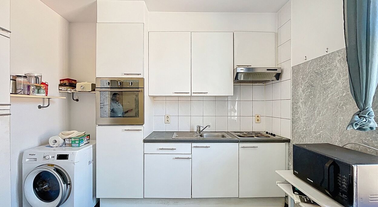 Woning met studio en duplex appartement te koop in Gen