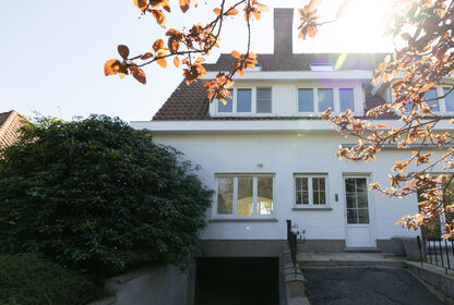 Woning met 4 slaapkamers, tuin en garage te Wondelgem